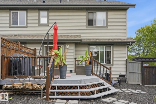 Multi-level deck with dark wood-finish railing and stairs - 20007 131 Avenue Nw, Edmonton, AB 