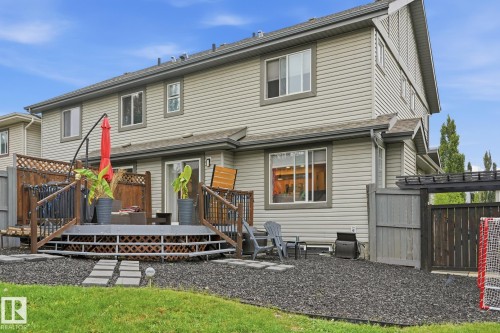 Multi-level wood-finish deck with lattice detailing and privacy screening - 20007 131 Avenue Nw, Edmonton, AB 