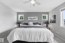 Recessed lighting, ceiling fan, and multiple windows - 
