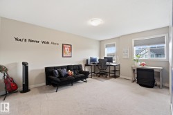 Neutral wall tones, recessed lighting, and carpeted flooring - 