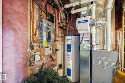 Electrical panel, water heater, and Armstrong Air HVAC system with humidifier - 