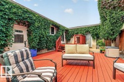 Expansive red-stained deck with direct building access - 