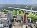 Property is situated on the west end of Jasper Avenue, across from a grocery store, nearby cafes & restaurants and surrounded by the river valley (trails, golf, promenade). South view from balcony facing river valley. - #602 12303 Jasper Av Nw, Edmonton, AB 