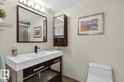 Updated 4 Piece Bathroom featuring stylish vanity, and Tub/Shower. - 