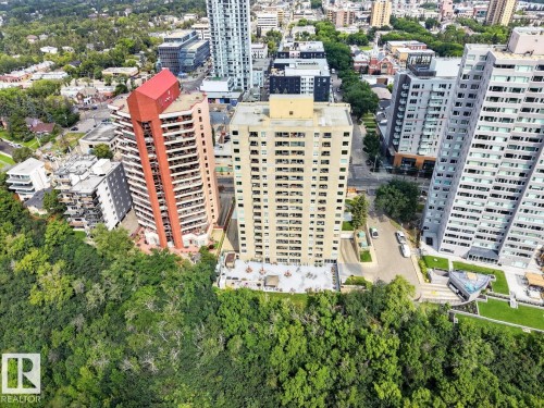 Concrete High-rise building with a ground-level patio, and surrounding urban landscape - #602 12303 Jasper Av Nw, Edmonton, AB 
