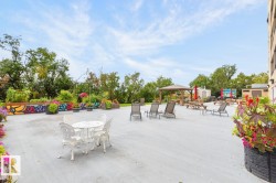 What if you want to take that party outside? No problem! Lounge chairs, picnic tables, gazebo and garden and 3 BBQ’s! - 