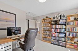 Built-in shelving units, light-colored walls, and a light-colored ceiling - 