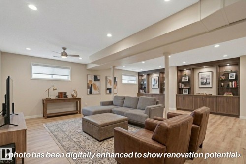 Recessed lighting, wood-finish flooring, built-in shelving, built-in cabinetry, and ceiling fan - 591 Byrne Crescent Sw, Edmonton, AB 