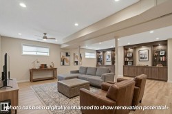 Recessed lighting, wood-finish flooring, built-in shelving, built-in cabinetry, and ceiling fan - 