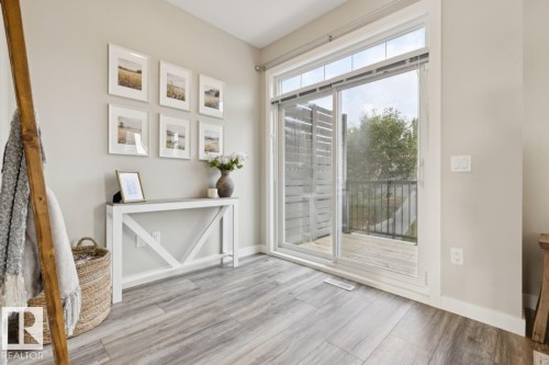 Bonus area off living room - #13 600 Bellerose Dr, St. Albert, AB - Indoor Photo Showing Other Room