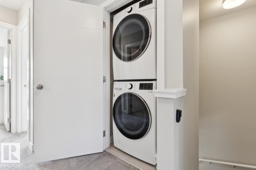 Upstairs laundry - #13 600 Bellerose Dr, St. Albert, AB - Indoor Photo Showing Laundry Room