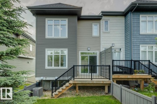 Backyard and deck - #13 600 Bellerose Dr, St. Albert, AB - Outdoor With Deck Patio Veranda With Exterior