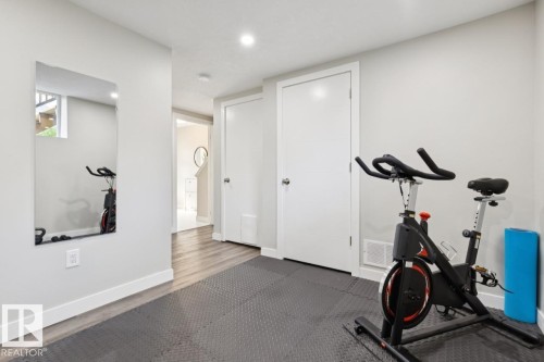 1st floor flex room or bedroom - #13 600 Bellerose Dr, St. Albert, AB - Indoor Photo Showing Gym Room