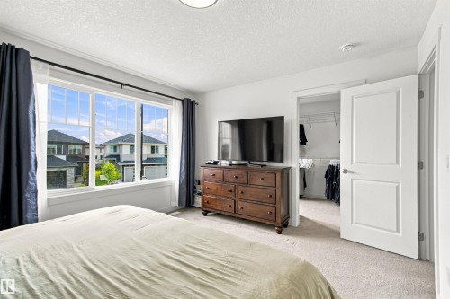 White trim window offering exterior views - 107 Ellice Bend, Fort Saskatchewan, AB 