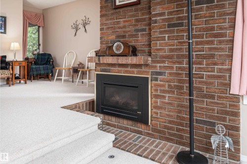 2408 115 Street Nw, Edmonton, AB - Indoor Photo Showing Living Room With Fireplace