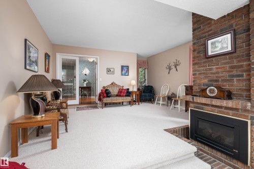 2408 115 Street Nw, Edmonton, AB - Indoor Photo Showing Living Room With Fireplace