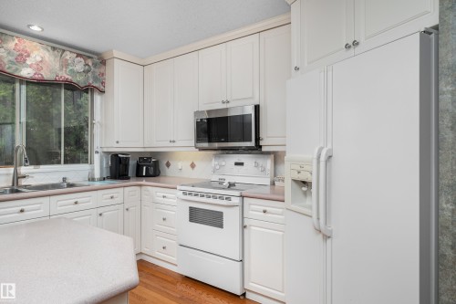 2408 115 Street Nw, Edmonton, AB - Indoor Photo Showing Kitchen With Double Sink