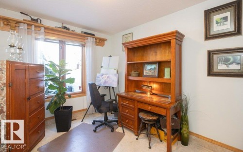 Wood-trim window with sheer drapery - 11007 108 Avenue, Westlock, AB 