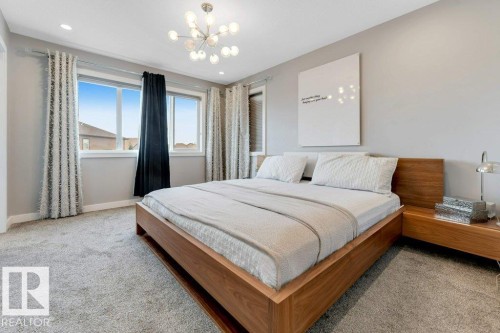 Neutral-toned carpeting with recessed lighting - #45 16903 68 St Nw, Edmonton, AB 
