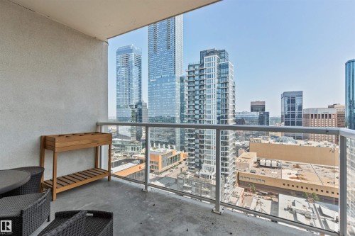 Exterior balcony featuring a concrete floor and a glass railing system - #2205 10226 104 St Nw, Edmonton, AB - Outdoor With Balcony