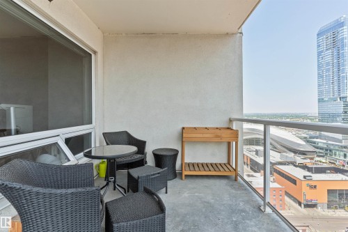 Private balcony with a concrete surface and glass railing - #2205 10226 104 St Nw, Edmonton, AB - Outdoor With Exterior