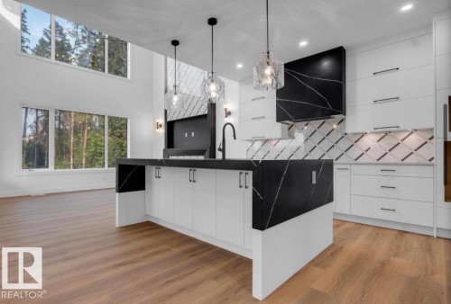 Photos shown are from a previously completed home by same builder and are included for reference. Finishes in this home will be similar but may vary slightly. - 8414 223A St Nw, Edmonton, AB 