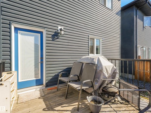 Outdoor wood-finish deck with metal railings - 6453 177A Avenue Nw, Edmonton, AB 