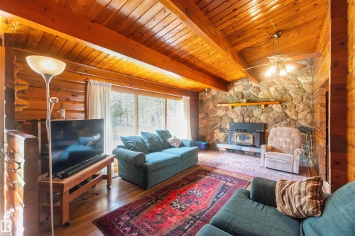 910 Hermitage Avenue, Rural Parkland County, AB - Indoor Photo Showing Living Room With Fireplace