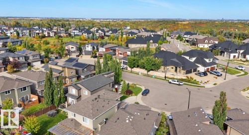 Expansive residential neighborhood featuring varied architectural styles and mature landscaping - 885 Windermere Wynd Nw, Edmonton, AB 