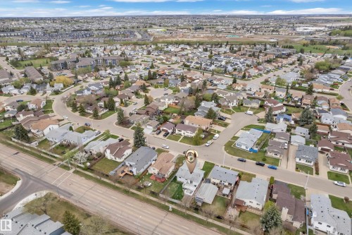 Suburban neighborhood setting with residential streets and detached homes - 3227 145 Avenue Nw, Edmonton, AB 