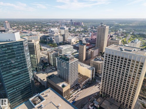 Urban landscape featuring high-rise buildings and commercial structures - #1313 10024 Jasper Av Nw, Edmonton, AB 