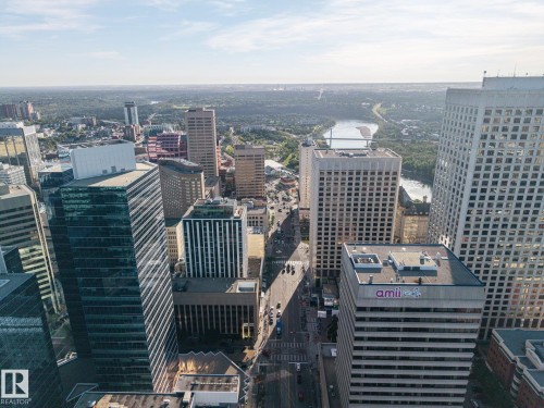 Urban landscape featuring high-rise buildings, a prominent river, and extensive green spaces - #1313 10024 Jasper Av Nw, Edmonton, AB 