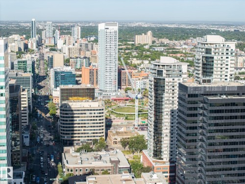 Urban landscape featuring multiple high-rise buildings and extensive tree-lined streets - #1313 10024 Jasper Av Nw, Edmonton, AB 