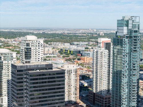 Urban skyline with a mix of high-rise residential and commercial buildings - #1313 10024 Jasper Av Nw, Edmonton, AB 