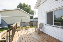 Expansive wood deck with full balustrade - 