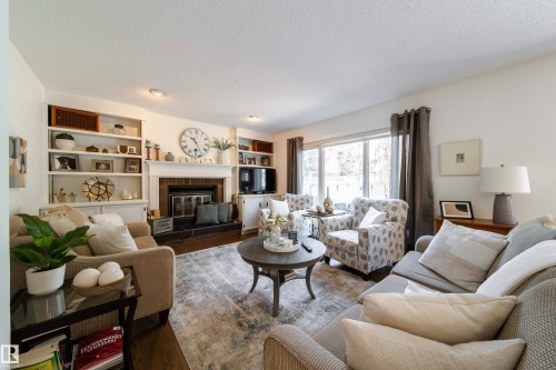 716 Hendra Crescent Nw, Edmonton, AB - Indoor Photo Showing Living Room With Fireplace