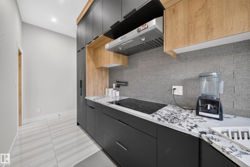 4017 47 Avenue, Beaumont, AB - Indoor Photo Showing Kitchen With Upgraded Kitchen