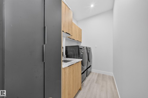 4017 47 Avenue, Beaumont, AB - Indoor Photo Showing Laundry Room