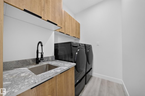 4017 47 Avenue, Beaumont, AB - Indoor Photo Showing Laundry Room