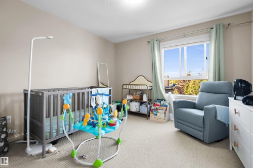 Neutral-toned wall paint and light-colored carpeting - #5 5120 164 Av Nw, Edmonton, AB 