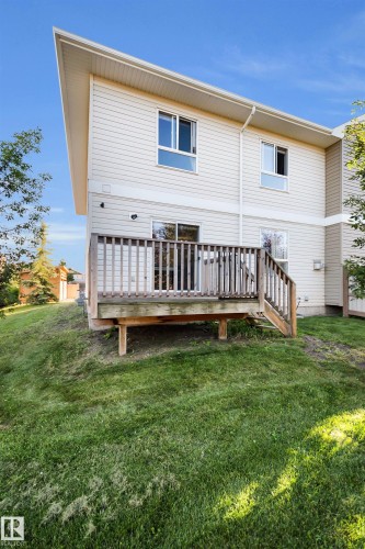 Wood-finish deck with railing and stairs - #5 5120 164 Av Nw, Edmonton, AB 