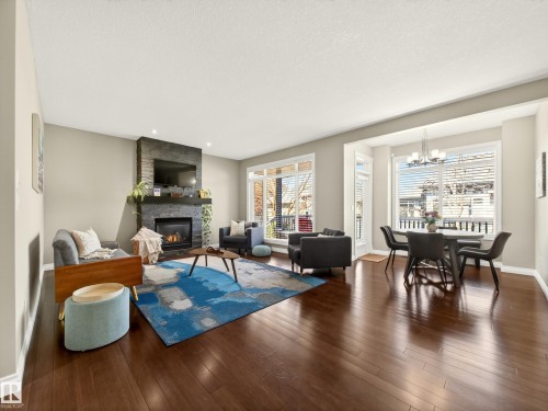 5610 Pierre Court, Beaumont, AB - Indoor Photo Showing Living Room With Fireplace