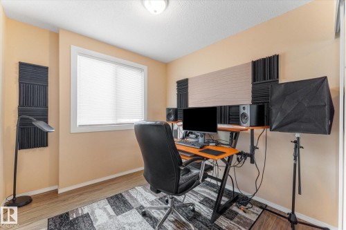Room featuring light-toned walls and wood-finish flooring - 173 Cornell Court Nw, Edmonton, AB - Indoor Photo Showing Office