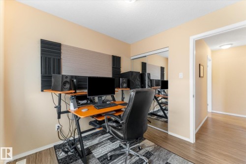 Dedicated room featuring wood-finish flooring and light-toned wall paint - 173 Cornell Court Nw, Edmonton, AB - Indoor Photo Showing Office