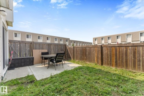 Private backyard featuring a concrete patio and a wooden privacy fence - 173 Cornell Court Nw, Edmonton, AB - Outdoor
