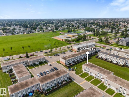 Aerial perspective showcasing a residential community with townhome-style residences - 173 Cornell Court Nw, Edmonton, AB - Outdoor With View