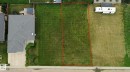 Generous lot featuring a rectangular shape and existing grass coverage - 20 Monterey Estates, Wetaskiwin, AB 