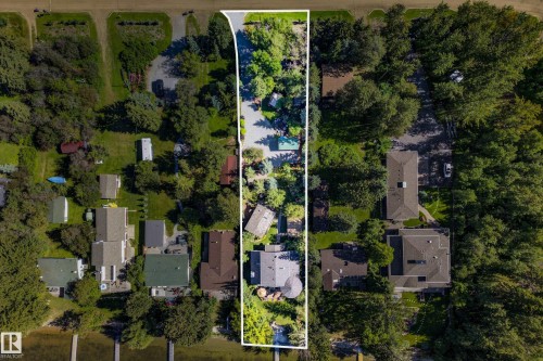Expansive property featuring dense mature trees and a substantial land footprint - 51 Itaska Beach, Rural Leduc County, AB 