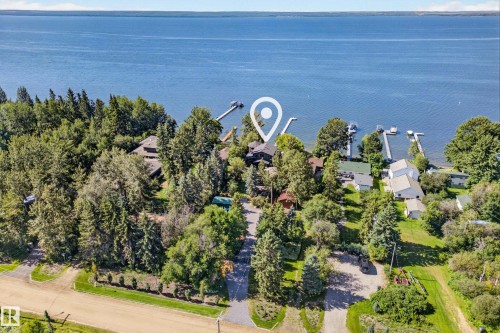 Waterfront property with extensive tree coverage and multiple private docks - 51 Itaska Beach, Rural Leduc County, AB 