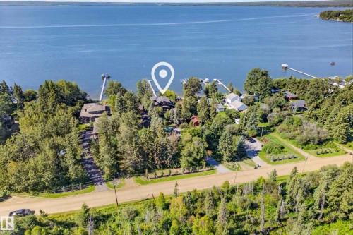 Lakeside property with extensive water frontage and multiple private docks - 51 Itaska Beach, Rural Leduc County, AB 